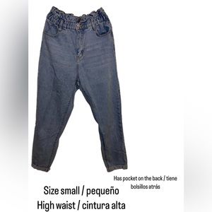 Size small high waist jeans. Not skinny.